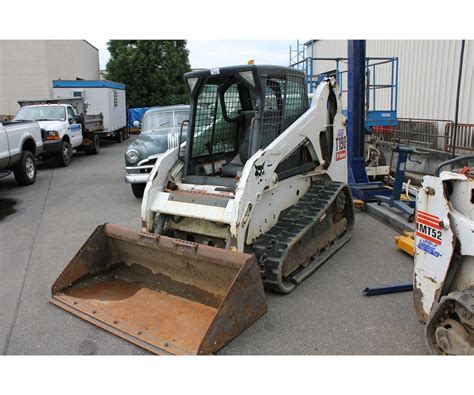 skid steer enginepulls out back|skid steer t190 right track pulls.